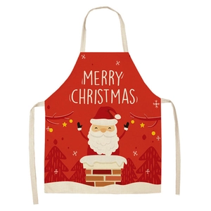 Detail of red Christmas apron featuring Santa Claus and Merry Christmas print