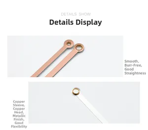 Detail of copper and metal clock hands connector with polished finish and round hole