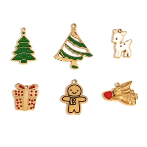Detail of 14K gold plated Christmas charms featuring reindeer and enamel holiday trees
