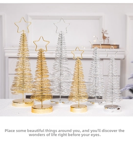 Set of six gold and silver spiral wire Christmas tree ornaments with star tree toppers