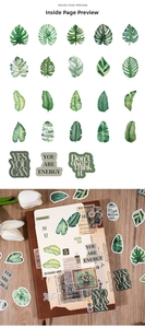 Detail view of vintage dark forest stickers with tropical leaves for junk journaling
