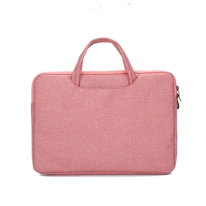 Pink waterproof laptop sleeve with durable handles and secure black zipper closure