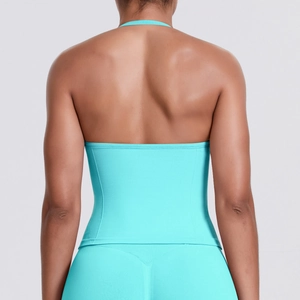 Detail of teal seamless yoga top with a stylish backless design for fitness and running