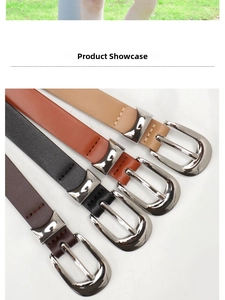 Detail of four colorful faux leather belts with polished silver metal buckles and stitching