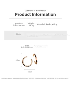 Dettaglio degli orecchini in resina ambrata da 4,5 cm con indicazione di misure e peso totale