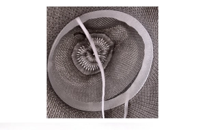Detail of grey sun hat interior featuring woven texture, sweatband and elastic chin strap