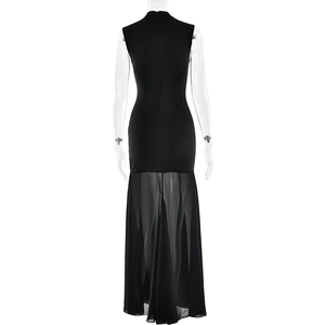 Detail of slim-fit dress with sheer tulle patchwork and mesh back on black maxi skirt