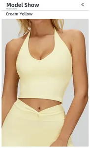 Gros plan du soutien-gorge de sport dos nu jaune crème montrant la texture et le col en V