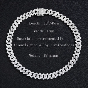 Silver Cuban link necklace with rhinestones, 15mm width, 18 inch length on black background