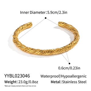 Detailed view showing dimensions and twist texture of the 18K gold plated bangle