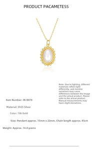 Detailed macro of vintage oval pearl pendant in 18k gold plated S925 sterling silver