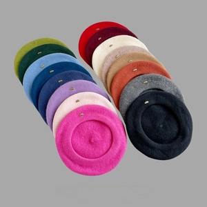 Chic wool beret for women in 14 vibrant colors with metallic logo detail for autumn style