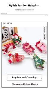 Detail view of 6-piece Christmas acrylic hair claw clips with elk and snowman designs