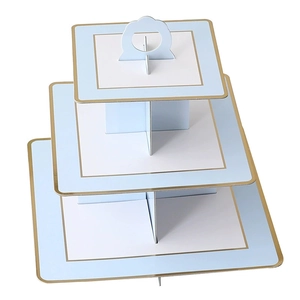 Detailed close-up of a three-tier light blue paper cupcake stand with golden edges