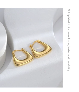 Macro shot of S925 sterling silver gold plated earrings showing S925 hallmark