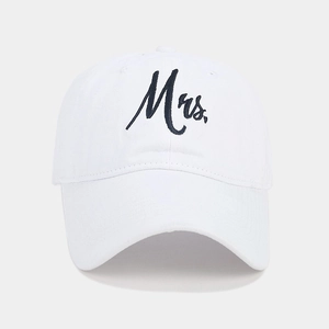Close-up of Mrs. embroidery on white washed cotton baseball cap for wedding gift