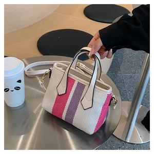 Fashionable striped canvas crossbody bag with pink and purple vertical color-block pattern