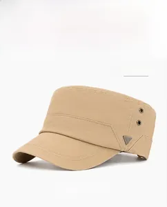 Detail of khaki cotton military cap featuring side metal eyelets and a triangle logo