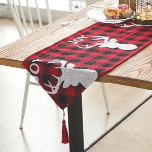 Christmas table runner with red black plaid elk pattern and festive tassels
