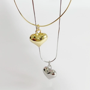 Elegant 925 sterling silver heart pendant necklace on a sleek snake bone chain in gold and silver
