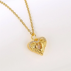 Gold angel wing heart pendant necklace with micro-paved cubic zirconia in a bright finish