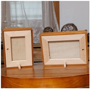 Detail of solid wood photo frame set with mortise and tenon joints in walnut finish