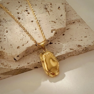 18K gold plated stainless steel necklace with irregular hammered pendant on twisted chain
