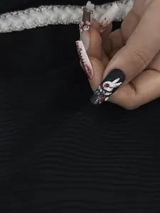 Gothic 3D embossed nail stickers featuring dark rabbit patterns and blood-splatter art