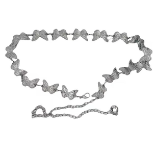 Close-up of butterfly link metal waist chain in silver finish with lobster clasp