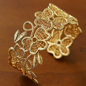 18k gold plated vintage open cuff bracelet with intricate floral lace texture and design