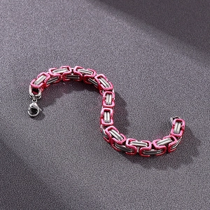 Macro view of 8mm silver and pink Byzantine chain necklace with lobster clasp closure