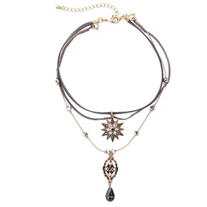 Layered bohemian choker necklace with crystal star pendant and black teardrop beads