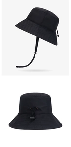 Detail view of quick-dry sun hat showing adjustable windproof strap and elastic buckle