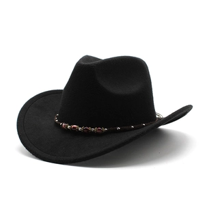 Classic black wool cowboy hat with red beaded decorative band and curved brim