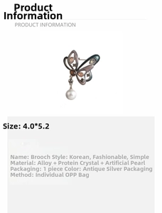 Detail showing butterfly brooch with opal crystal, antique silver alloy, and pearl drop