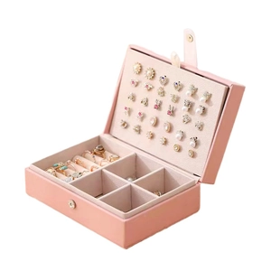 Pink minimalist jewelry box with velvet slots for rings and earrings in open view