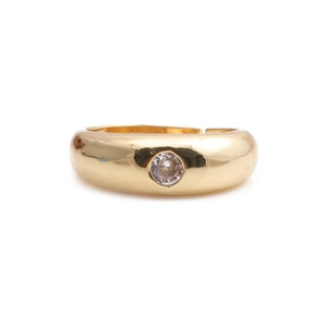 Minimalist gold plated ring featuring a single round cubic zirconia on a smooth band