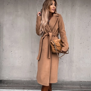 Elegant camel wool coat with large lapels and waist tie design for a professional look