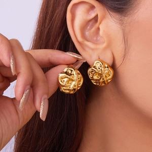 Modern gold irregular textured stud earrings with abstract pleated surface for women