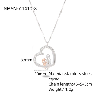 Detailed view of heart pendant necklace with dimensions and crystal-studded outline