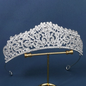 Elegant bridal crown with silver rhinestones on display for weddings and parties