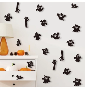 Ghost and hand silhouette wall stickers on white wall with Halloween pumpkins