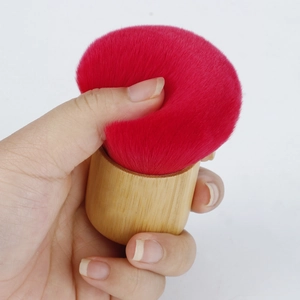 Bamboo handle kabuki brush with soft red bristles for powder and blush application