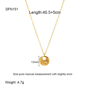 Detail view of 18k gold heart shell palm tree pendant with size and weight dimensions