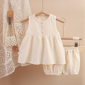 Baby girl cream cotton muslin two-piece pajama set with sleeveless top and shorts