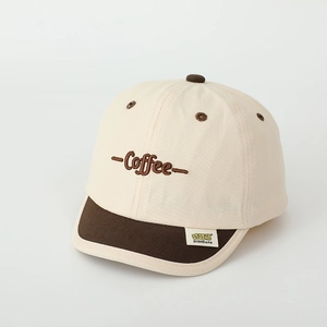 Detailed embroidery of Coffee text and brand tag on two-tone kids baseball cap
