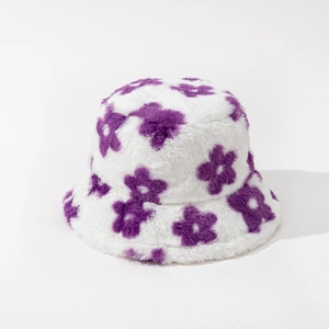 Close-up of plush purple floral pattern on fuzzy winter bucket hat for women