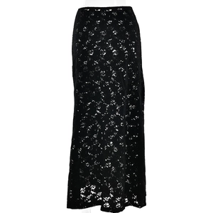 Close-up of elegant black lace texture and sheer mesh fabric on this high waist skirt
