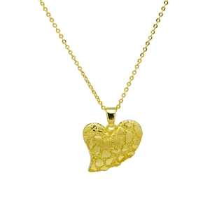 Macro shot of gold-plated heart pendant featuring a unique textured nugget finish
