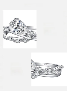 Macro shot of S925 sterling silver ring with hand-set pear-cut 5A grade zircon and accent diamonds